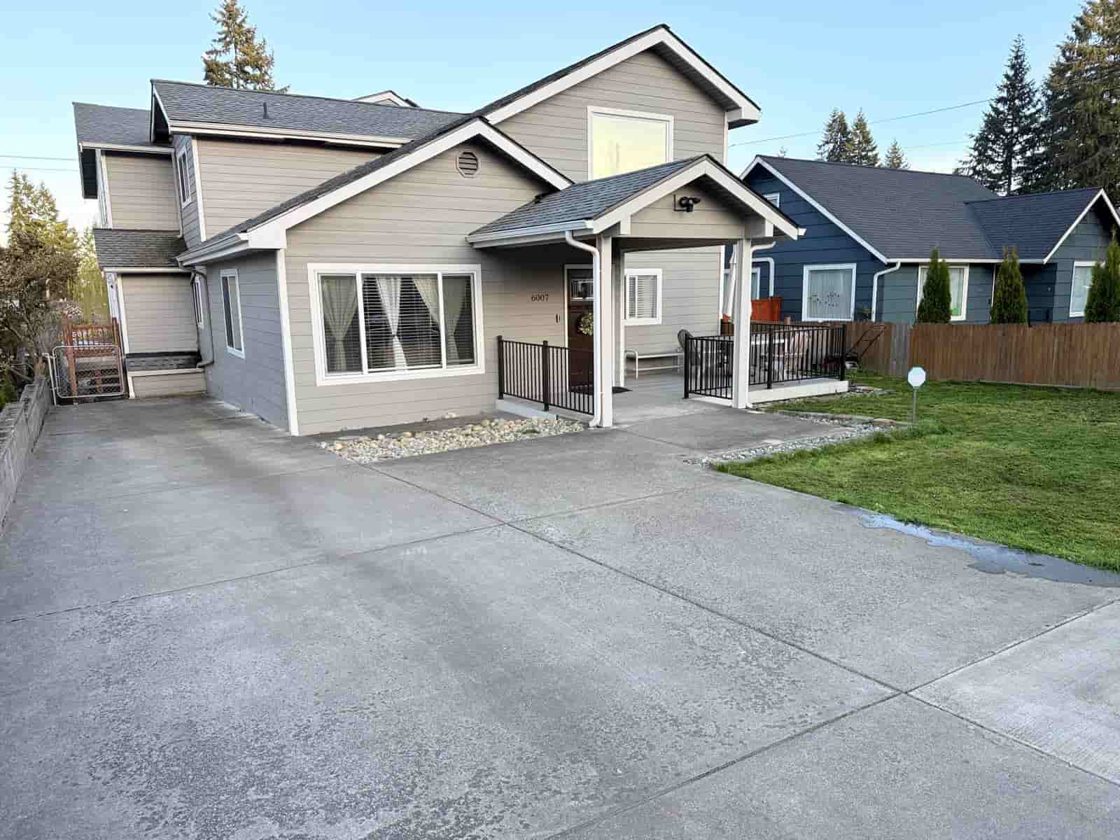 Bright, spacious lounge area with comfortable seating at 1st Blessed Adult Family Home, Everett WA